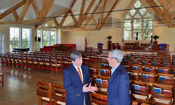 Two men discussing